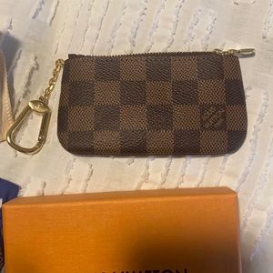 Brand new authentic Louis Vuitton key pouch (damier ebene cles pm)